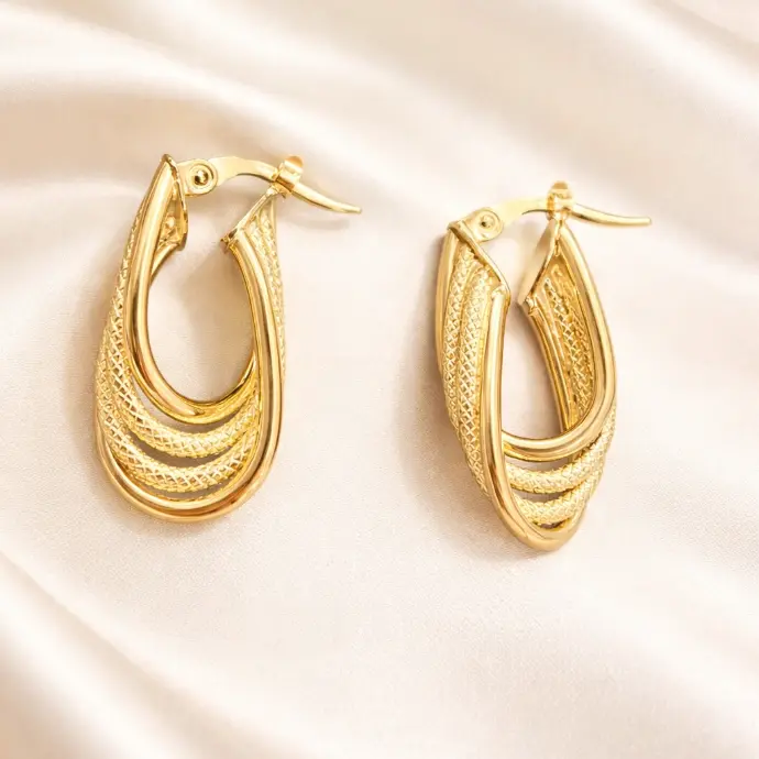 ARGOLLAS Trenzadas Labradas en Oro Amarillo de 18 Kilates