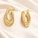 ARGOLLAS Trenzadas Labradas en Oro Amarillo de 18 Kilates