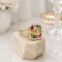 ANILLO Oro Amarillo de 18 Kilates con Brillantes y Zafiros de colores